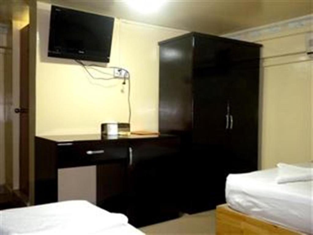 Golden Boat Guesthouse Phnom Penh Oda fotoğraf